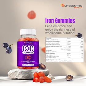 Gummies de fer LifeCentric Health 290g sur une table avec un verre d'eau