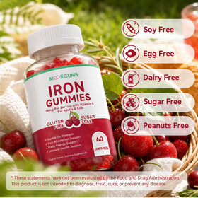 Gummies de Fer MOORGUMY, avec des fruits en arrière-plan
