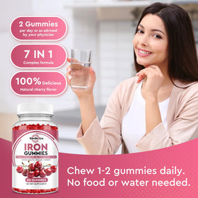 Gummies de fer ReviNutra avec un arrière-plan de fruits cerise