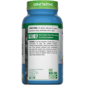 Gummies de Magnésium Glycinate Nature's Truth 200mg 120 Comp. avec une main tenant une gummy