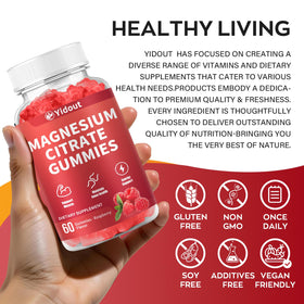 Gummies de magnésium Yidout sur une table avec fruits