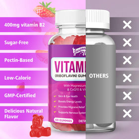 Gummies de Vitamine B2 Saajoor à côté d'un verre d'eau