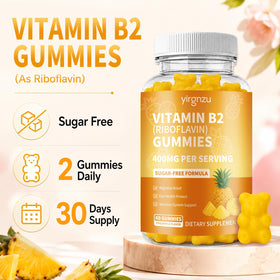 Gummies de Vitamine B2 yirgnzu avec un verre d'eau à côté