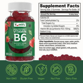 Gummies de vitamine B6 YUM-V'S sur une table avec des fraises