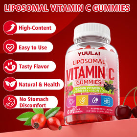 Gummies de vitamine C YUULAI sur une table avec des fruits