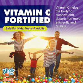 Gummies Dippin' Dots à côté d'un verre d'eau