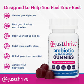 Gummies Just Thrive sur une table avec des fruits