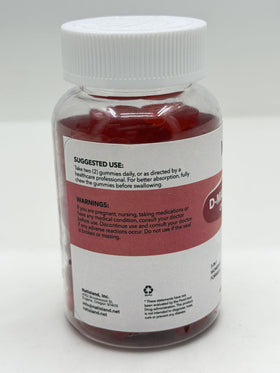 Gummies NATISLAND D Mannose sur une table en bois