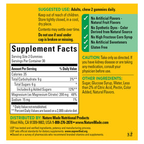 Gummies Nature Made avec des fruits frais en arrière-plan