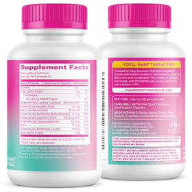 Gummies postnatales Pink Stork mises en scène avec des fleurs