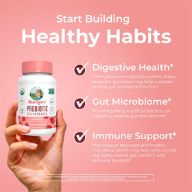 Gummies probiotiques bio MARYRUTH'S avec une main tenant une gomme