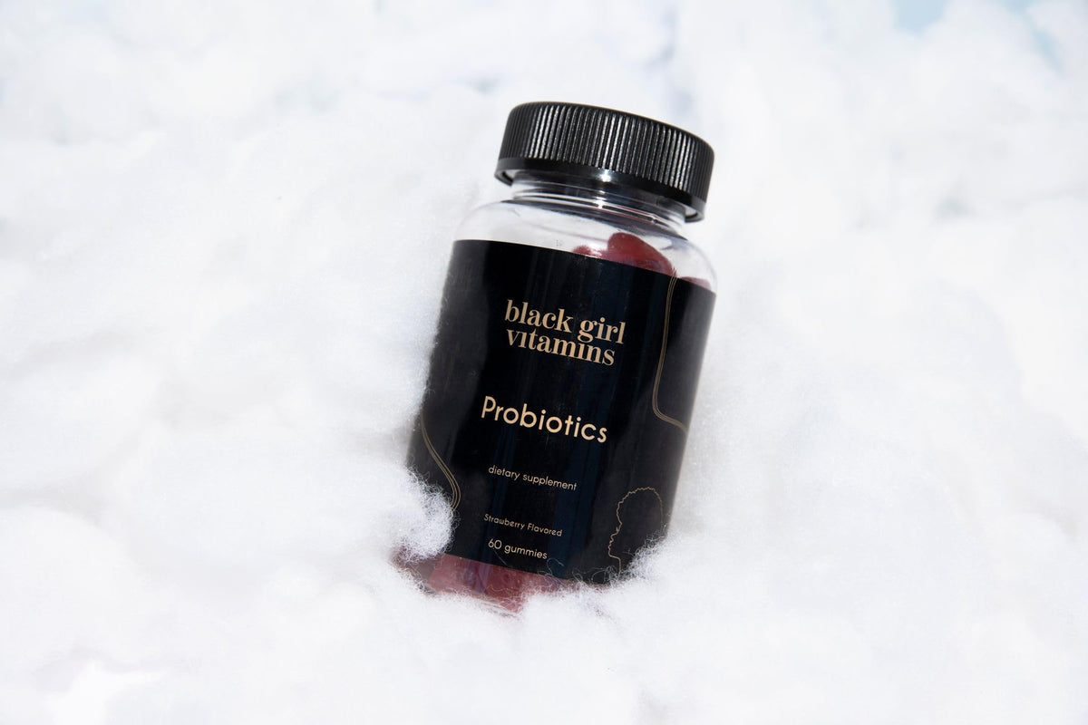 Gummies Probiotiques Framboise Pastèque Black Girl Vitamins, présentation sur une table