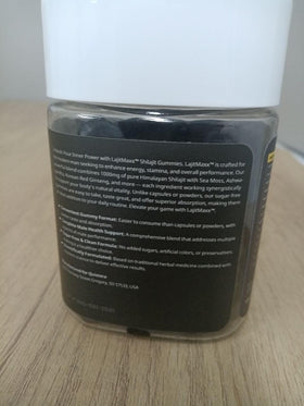 Gummies Shilajit Quixiora à côté de fruits frais