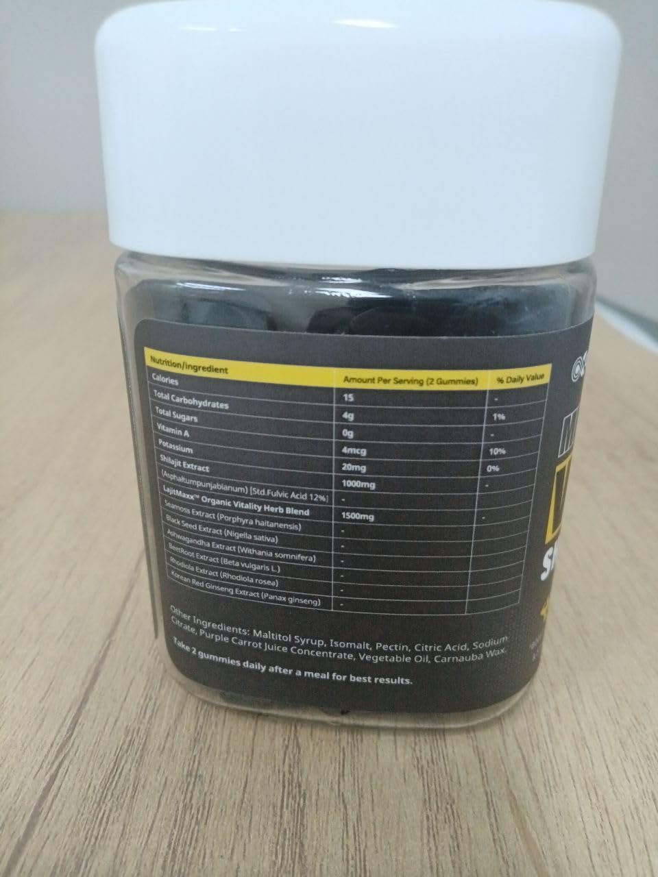 Gummies Shilajit Quixiora dans un pot en vue de dessus