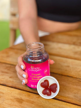 Gummies Simply Collagen avec une tranche d'orange à côté