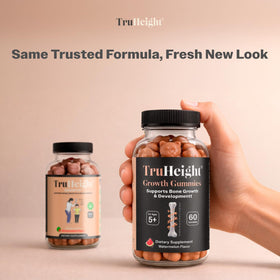 Gummies TruHeight sur une table avec des fruits frais