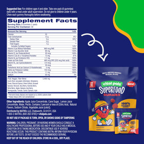 Gummies Vital Pals Citra-Berry avec fruits et légumes en arrière-plan