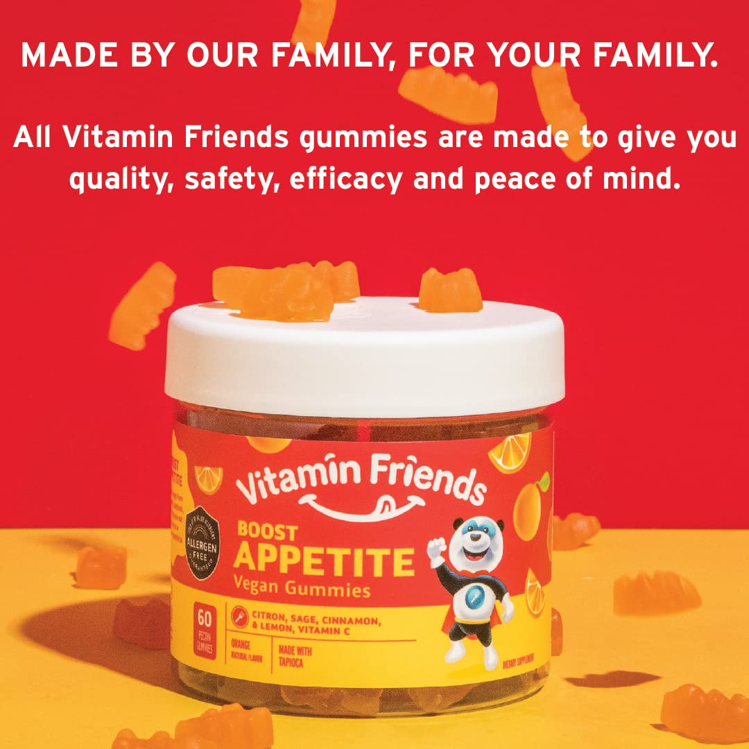 Gummies Vitamin Friends dans une main d'enfant