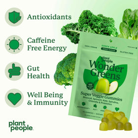 Gummies WonderGreens sur une table en bois
