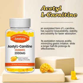 Gummies Zetelixia Acétyl L-Carnitine sur une table avec fruits