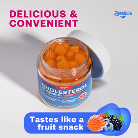 Gummies Zetelixia près d'un verre d'eau