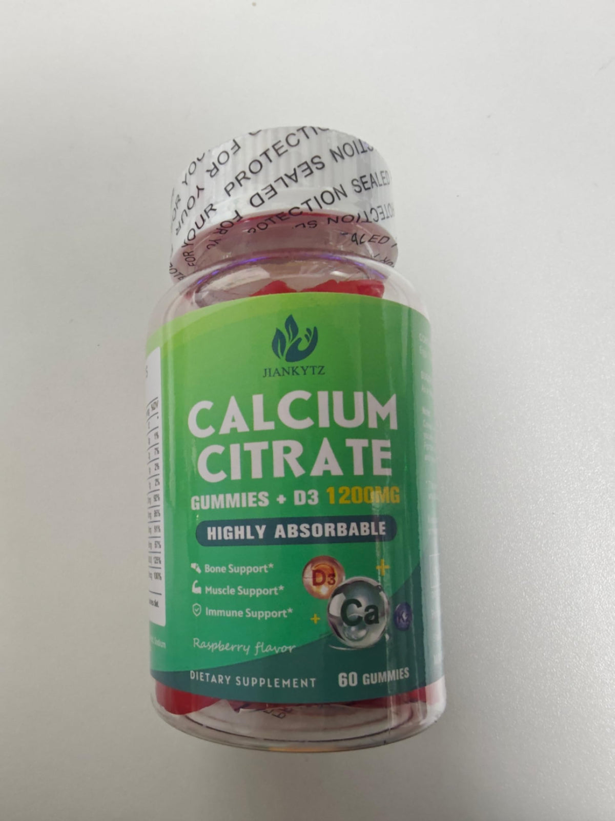 Gummy de citrate de calcium JIANKYTZ dans une main