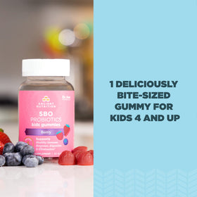 Gummy probiotique pour enfant Ancient Nutrition, saveur baie, à côté d'une cuillère