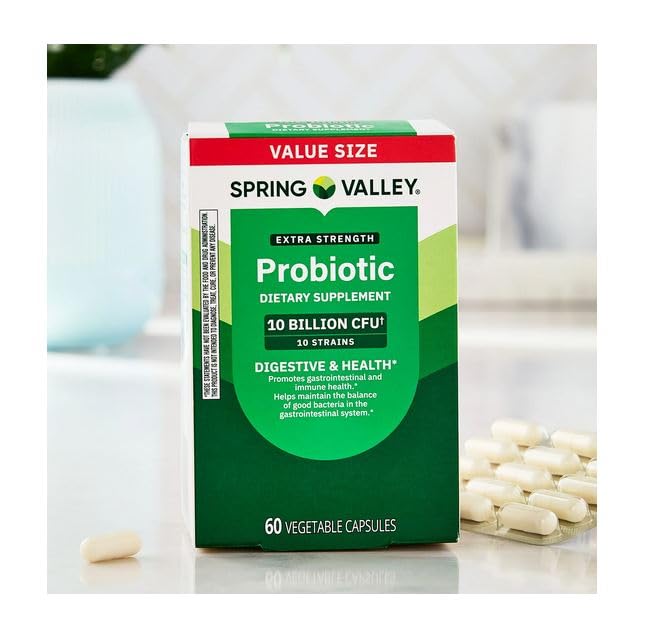 H4U Compléments Alimentaires Probiotiques Multi-Enzymes capsules sur une table