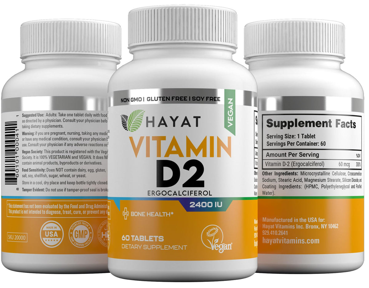 HAYAT Vitamine D Vegan 2400 IU comprimés dans une main