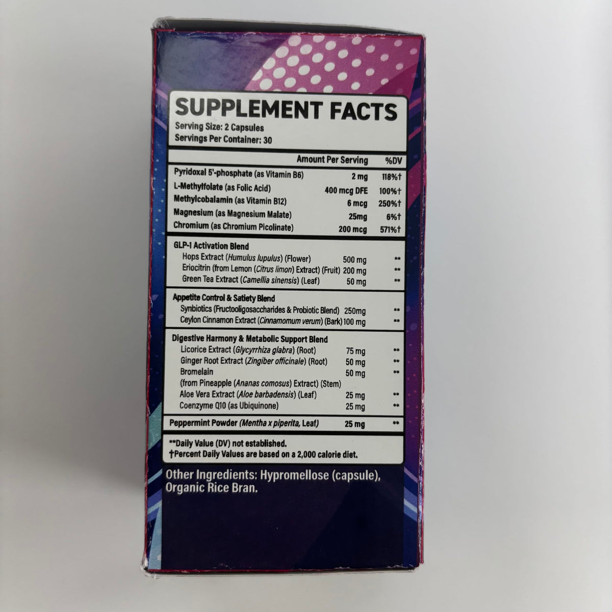 Heafetine GLP-1 Activation comprimés ouverts dans une main