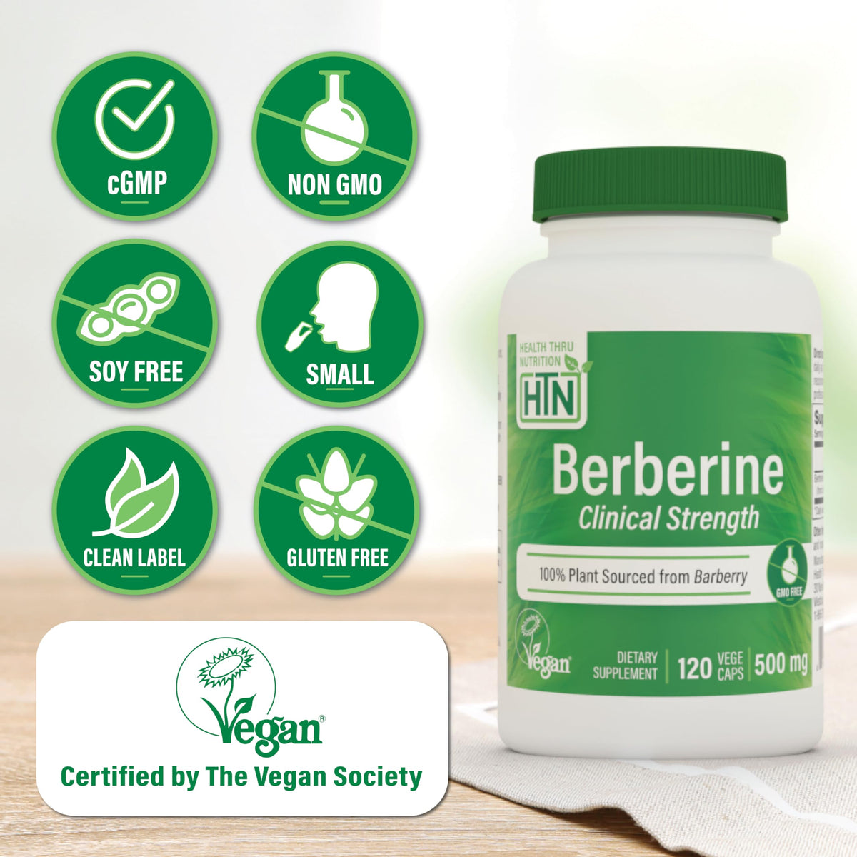 Health Thru Nutrition Berberine HCl 500mg capsule à côté d'une pièce de monnaie pour échelle