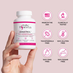 Healthy Bones Co. Annatrol 60cps sur une table avec des fruits