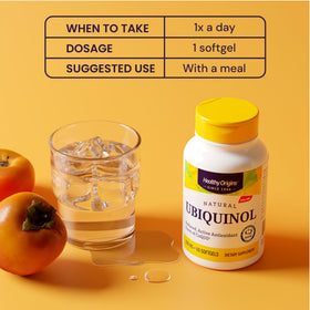 Healthy Origins Ubiquinol CoQ10 300 mg gélules à côté d'un verre d'eau