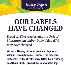 Healthy Origins Vitamine E 1 000 UI gélules molles avec un verre d'eau