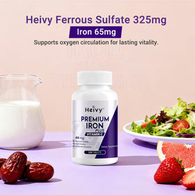 Heivy Fer 325mg avec Vitamine C, tablettes sur une surface blanche