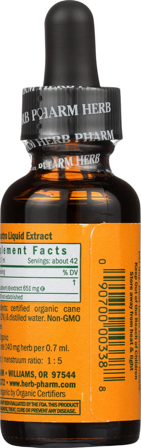 Herb Pharm Extrait de Coriandre Bio avec des feuilles de coriandre en arrière-plan