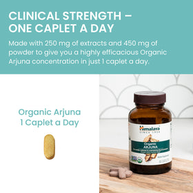Himalaya Arjuna Capsules 700 mg sur une table en bois