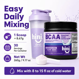 HINI Poudre BCAA agrumes avec fruits frais en arrière-plan