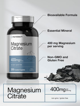 Horbäach Citrate de Magnésium 400mg, comprimés sur une surface blanche