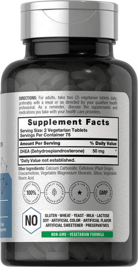 Horbäach DHEA 50mg comprimés sur une table avec des accessoires