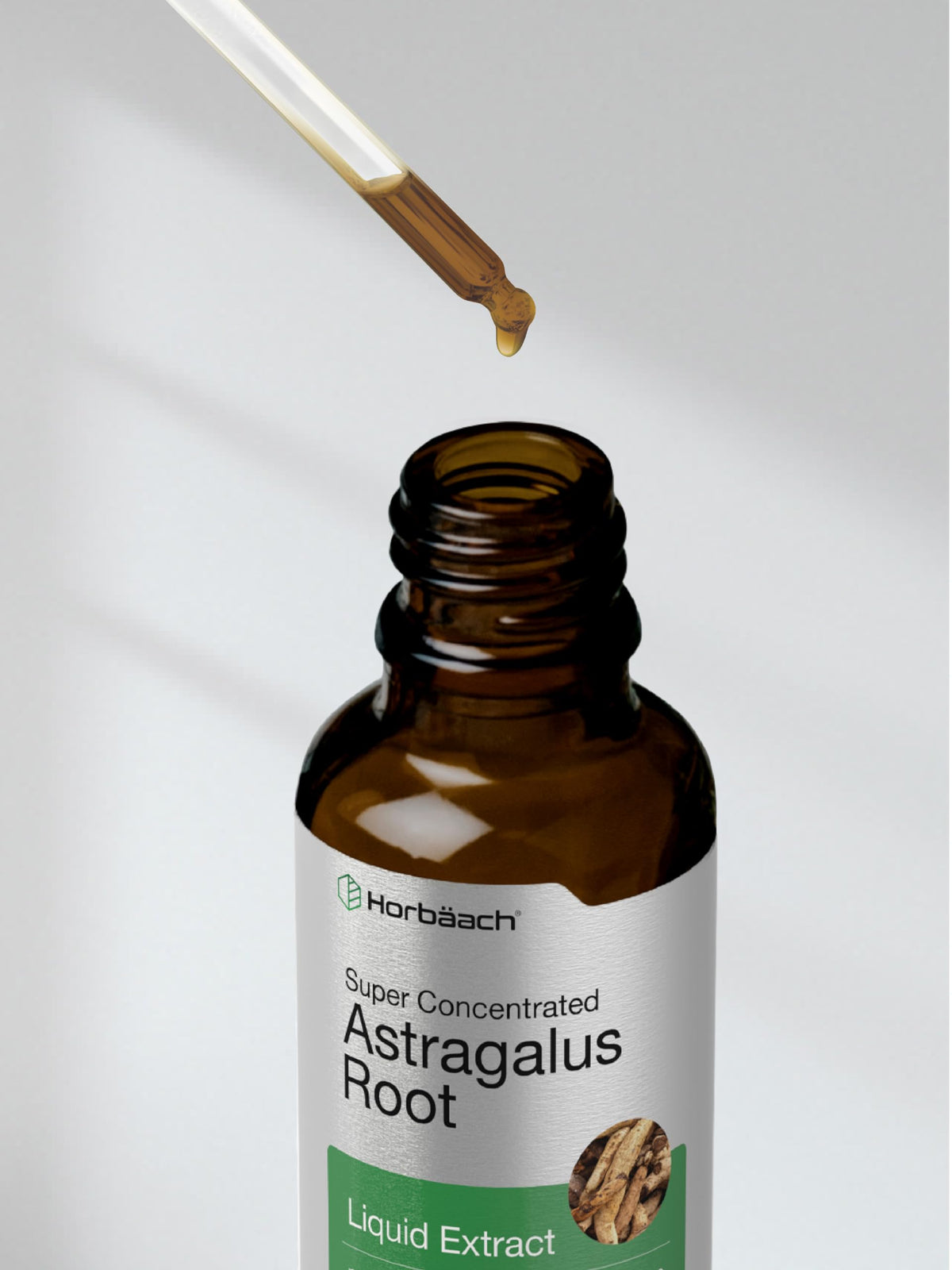 Horbäach extrait liquide racine d'astragale 60 ml sur une table en bois