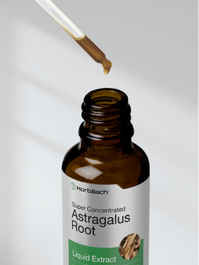 Horbäach extrait liquide racine d'astragale 60 ml sur une table en bois