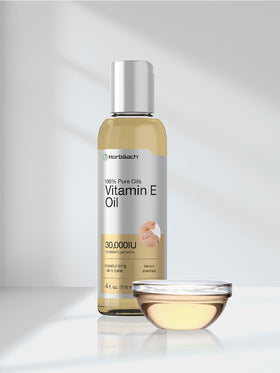 Horbäach huile de vitamine E sur table en bois