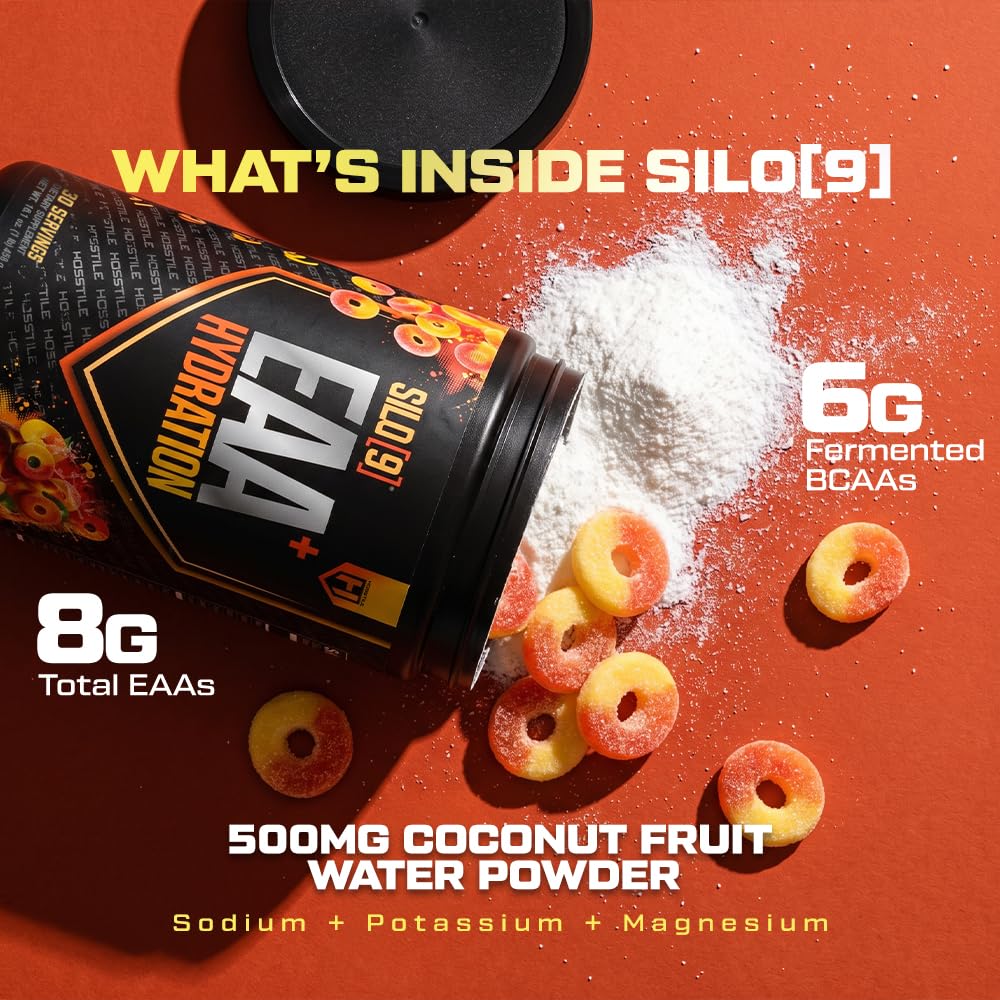 HOSSTILE SILO[9] Poudre EAA Hydratation 540g sur une table de gym