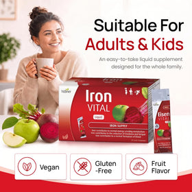 hübner Fer Vital Liquide sur une table avec fruits