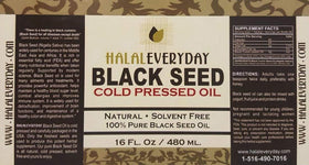 Huile de graines noires Halaleveryday placée sur un fond naturel