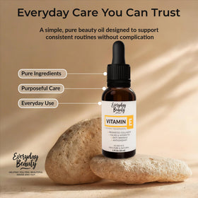 Huile de vitamine E Everyday Beauty dans un cadre de soins de beauté