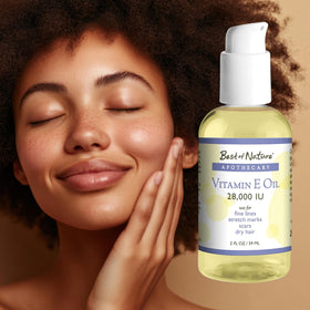 Huile de vitamine E ICShopToday versée sur la peau