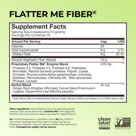 HUM Flatter Me Fiber Poudre 150g sur une table avec fruits