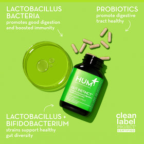 HUM Gut Instinct Probiotique capsules sur fond blanc